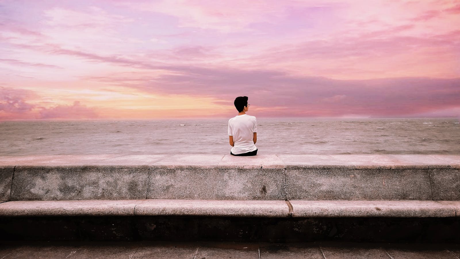 person sitting alone contemplation