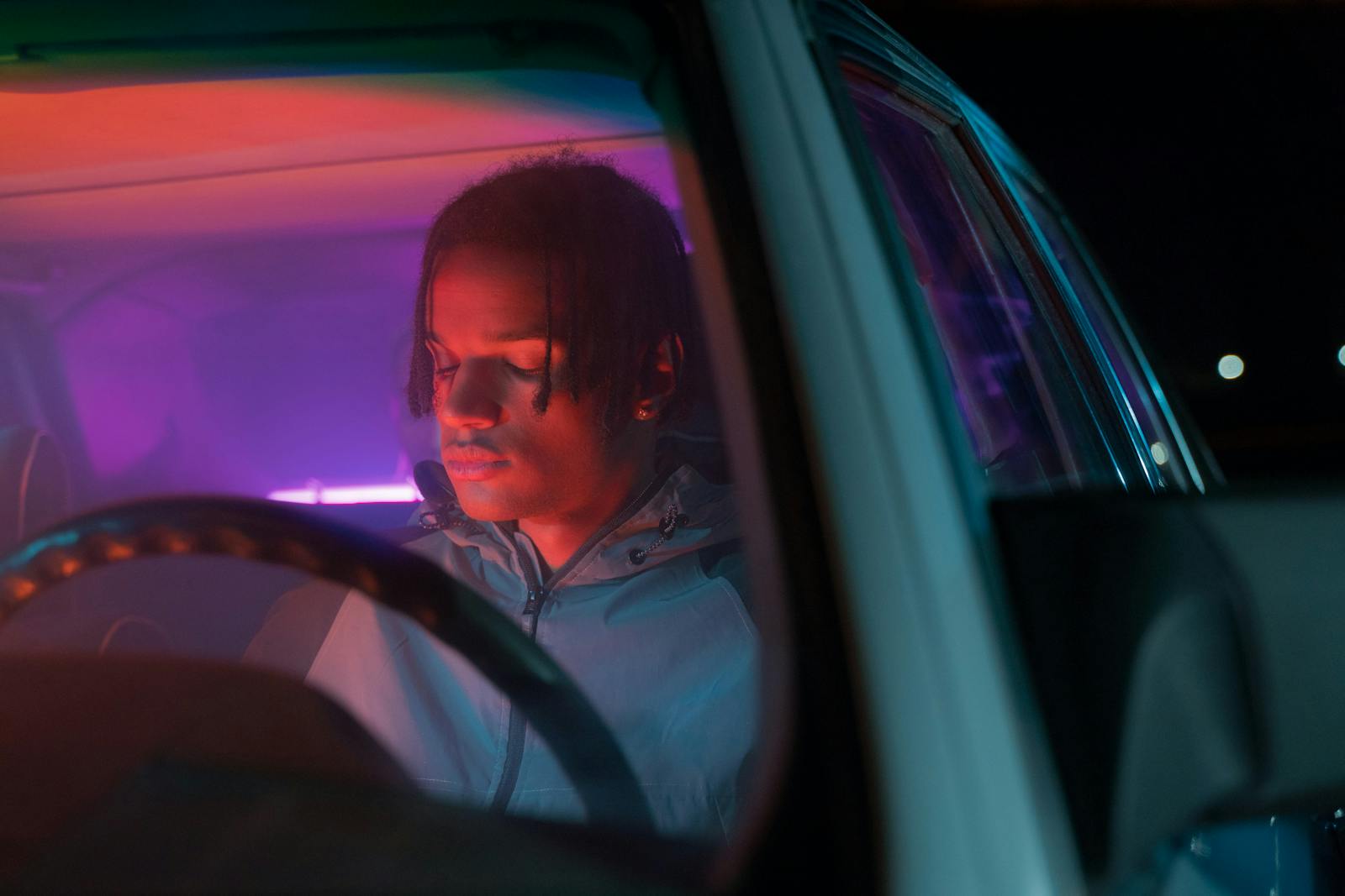 person sitting alone in car