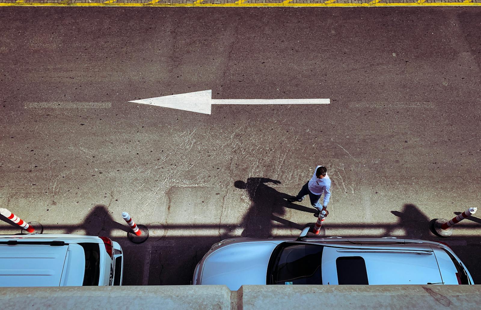 The colleague who stays composed during a layoff round and only falls apart in the parking lot isn't unusually professional, they learned somewhere that grief had to wait until it wouldn't cost anything